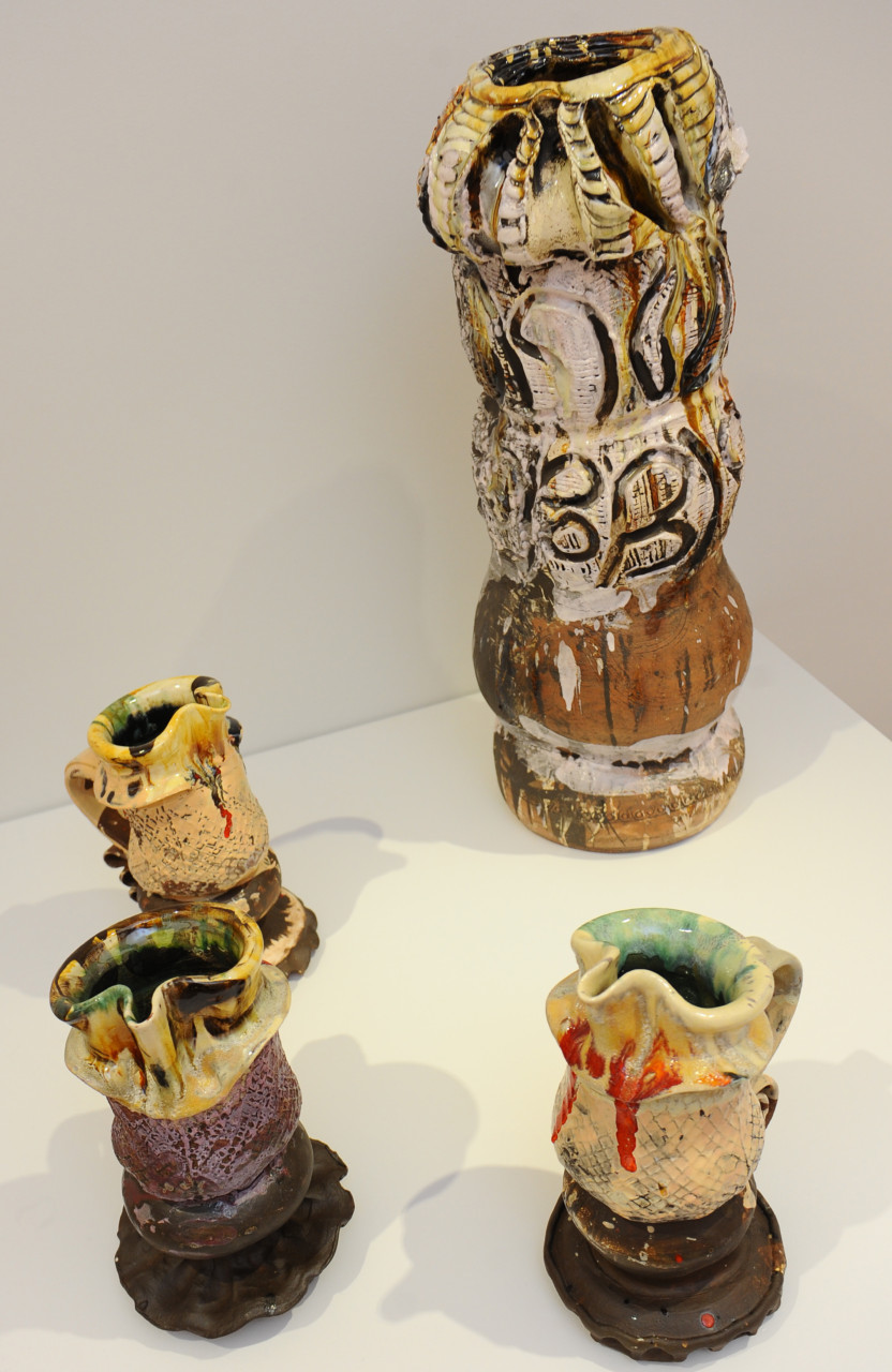 slip-painted earthenware with coloured glazes